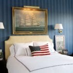 carter-and-company-interior-design-boys-bedroom-blue-white-stripes-wallpaper-nautical-art-americana-american-flag-pillow