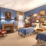 chicago-real-estate-listing-preppy-boy-bedroom-monogrammed-linens-blue-fireplace-antique-oil-portrait