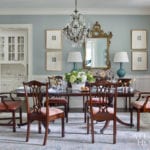lauren-deloach-atlanta-homes-traditional-dining-room-mahogany-table-chairs-framed-intaglios