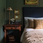 masculine-rustic-boys-bedroom-navy-hunter-green-antiques-art-gold-frames-Heidi Caillier Design