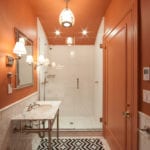 orange-bathroom-painted-subway-tile-geometric-marble
