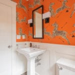 orange-scalamandre-zebras-wallpaper-bathroom-powder-room