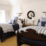 phoebe-howard-nautical-theemed-bedroom-blue-white-ships-sail-boats-ticking-stripes-sisal-rug-twin-beds