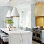 southeastern-designer-showhouse-lauren-deloach-marble-kitchen-blue-painted-cabinets-brass-oven-hood-stove