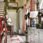 James-Farmer-Interior-designer-French-Country-Christmas-stairs-garland-ribbons-wreaths-on-windows-red-white-check-buffalo-print