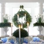carolyne-roehm-blue-and-white-christmas-paper-whites-holiday-wreath-evergreens-tablescape-tablesetting-ideas