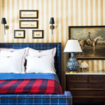 winfrey-blue-bedroom-veranda-traditional-preppy-old-school-classic-boy-room-tartan-plaid-checks-blue-navy-persian-rug-equestrian-art- fabric and wallpaper is by Clarence House linens Matouk