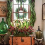 Amaryllis_HollyBerry_Arrangement-christmas-wreath-evergreen-garland-country-holiday-decorating-ideas-Washington, D.C., event planners Rick Davis and Christopher Vazquez