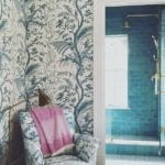 brunschwig-fils-bird-and-thistle-blue-wallpaper-aqua-bathroom-tile-shower-upholstered-chair