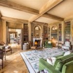 french-chateau-library-wood-paneled-green-velvet-sofa