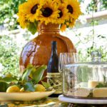 Barclay-Butera-Newport-Beach-Traditional-Home-sunflowers-tablescape
