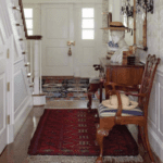 traditional-persian-rugs-entry-way-entrance-foyer-stairs-center-hall-brass-chandelier-southern-style-interior-design