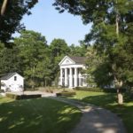 Gil-Schafer-greek-revival-house-Middlefield-carriage-house-boxwoods