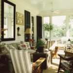 Gil-Schafer-greek-revival-house-Middlefield-sun-porch-wicker-chairs-sofa