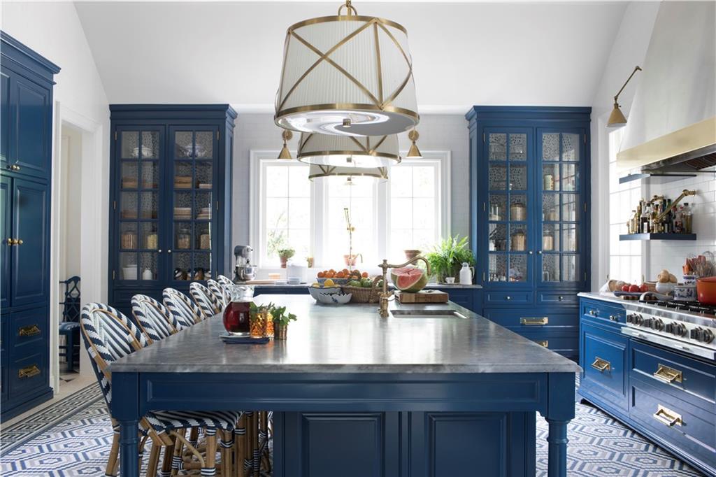 https://www.theglampad.com/wp-content/uploads/2020/07/danielle-rollins-atlanta-buckhead-georgia-home-for-sale-kitchen-island-blue-painted-cabinets-french-bistro-bar-stools.jpg