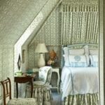 cathy-kincaid-house-beautiful-attic-bedroom-dolly-sister-parish-upholstered-walls-matching-canopy-bed