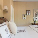 cathy-kincaid-interior-design-leontine-linens-bedding-monograms-masculine-bedroom-beige