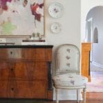 nicola-bathie-mclaughlin-home-tour-abstract-art-chintz-chair-amy-berry