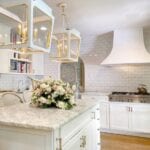 nicola-bathie-mclaughlin-home-tour-interior-design-kitchen-marble-island-sconces