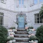 emily-hertz-tudor-home-atlanta-pumpkins-doorstep-pink-blue-cinderella