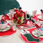 christmas-holiday-kids-table-sister-parish-tucker-fabric-fern-green-tablecloth-wooden-toys-nutcrakers-ragan-cain