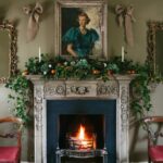 lulu-benson-neidpath-castle-in-scotland-christmas-decorations-mantel-fireplace-antique-portrait-bows