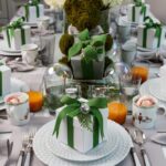 stephanie-booth-shafran-youre-invited-holiday-christmas-entertaining-tips-guide-tablescape-green-silver-bells-white-presents-limoges-bernardaud-grenadiers-nutcrackers-cocoa-candy-canes
