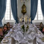 pink-castle-french-elegance-france-phoebus-interiors-dining-room-crystal