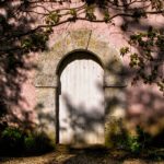 pink-castle-french-elegance-france-phoebus-interiors-garden-door