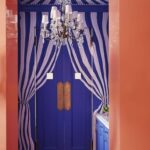 Chiqui-Woolworth-colorful-park-avenue-apartment-cabana-faux-painting-ceiling-walls-concealed-door-stripes
