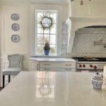classic-white-kitchen-blue-and-white-plates-hanging-on-wall