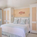 phoebe-howard-palm-beach-closets-on-either-side-of-bed-cabinets-bedroom