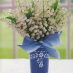 blue-and-white-bow-vase-lily-of-the-valley-bouquet