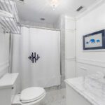 monogrammed-shower-curtain-blue-white-carrara-bathroom
