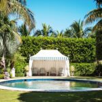 chinoiserie-pool-pavilion-cabana-round-pool-striped