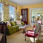 john-travolta-kelly-preston-islesboro-maine-house-for-sale-english-country-style-green-velvet-sofa