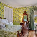 john-travolta-kelly-preston-islesboro-maine-house-for-sale-floral-chintz-wallpaper-bedroom