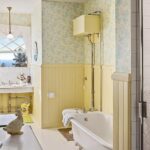 john-travolta-kelly-preston-islesboro-maine-house-for-sale-yellow-bathroom-clawfoot-tub-antique-toilet-pull