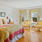 john-travolta-kelly-preston-islesboro-maine-house-for-sale-yellow-chintz-bedroom