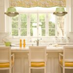 white-marble-kitchen-classic-yellow-accents-1940s-lighting