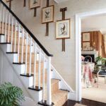 brittany-bromley-interior-design-stairs-entrance-birds-aviary-prints-hanging-on-ribbons