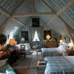 cozy-attic-bedroom-colefax-fowler-lincoln-exposed-beams-eaves