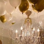 cover-new-years-even-dinner-party-silver-gold-tablescape-balloons-elegant-glamorous-crystal-chandelier