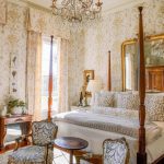 beige-neutral-toile-les-touches-brunschwig-fills-pillows-fortuny-french-chairs-canopy-bed-four-poster