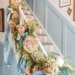 Laura-Solensky- Design-Christmas-holiday-home-tour-The-Glam-Pad-banister-stairs-garland